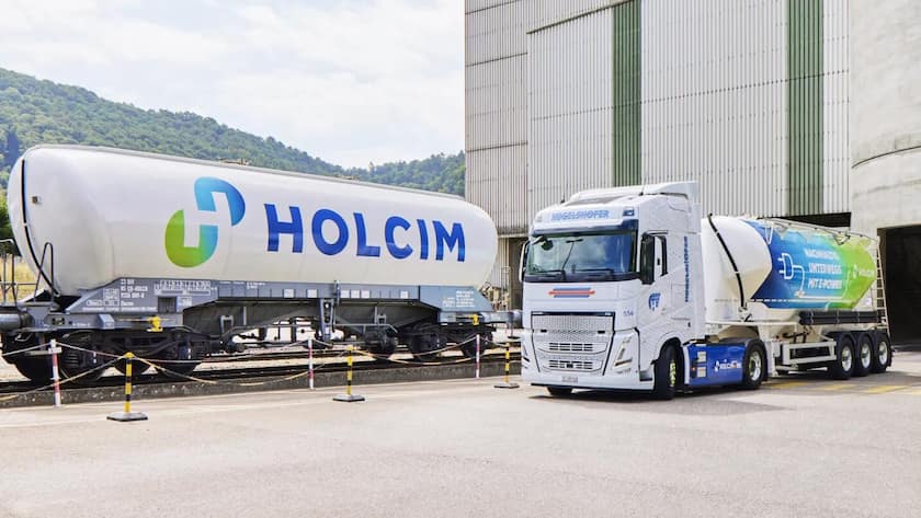 Baustoff-Aktien unter Druck: Warum Holcim und Sika besser dastehen als die Konkurrenz Lastwagen und Kesselwagen von Holcim.
